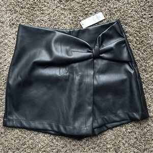 Black Faux Leather Skort with Bow Detail